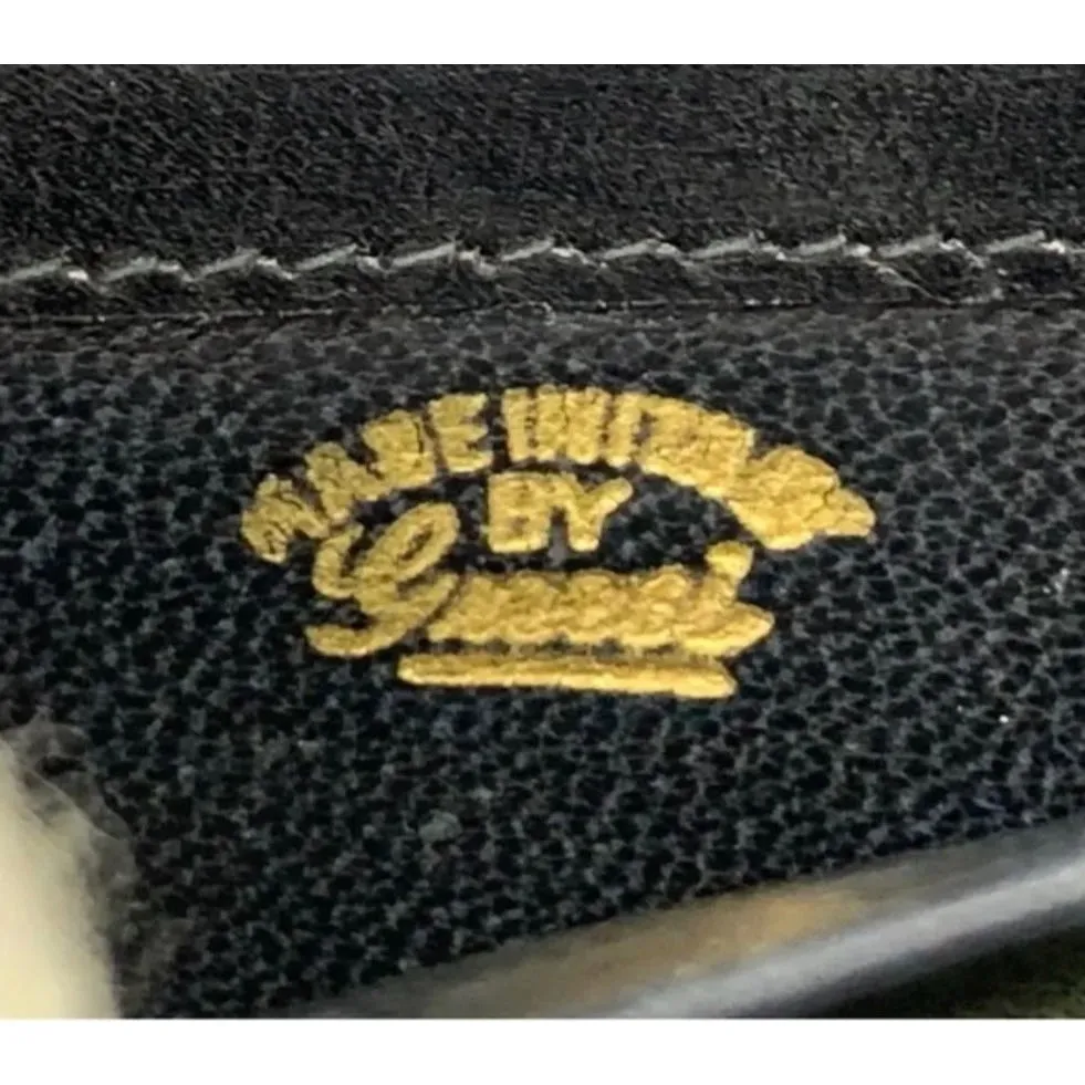 Rare, early Gucci, black Gucissima print canvas and black leather, semi-circular shape, wallet with an inlaid red and green Sherry stripe
