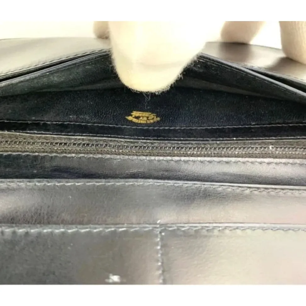 Rare, early Gucci, black Gucissima print canvas and black leather, semi-circular shape, wallet with an inlaid red and green Sherry stripe