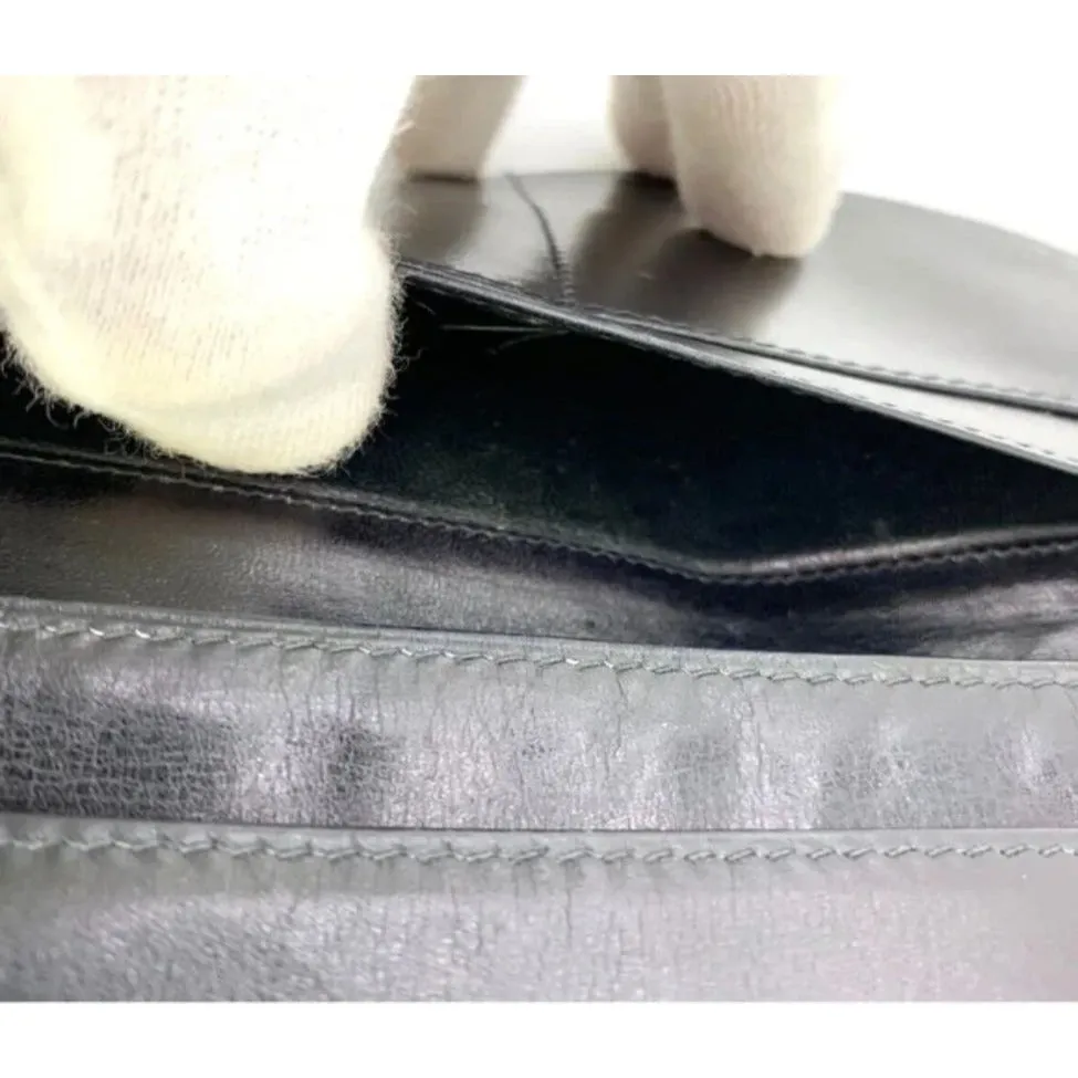 Rare, early Gucci, black Gucissima print canvas and black leather, semi-circular shape, wallet with an inlaid red and green Sherry stripe