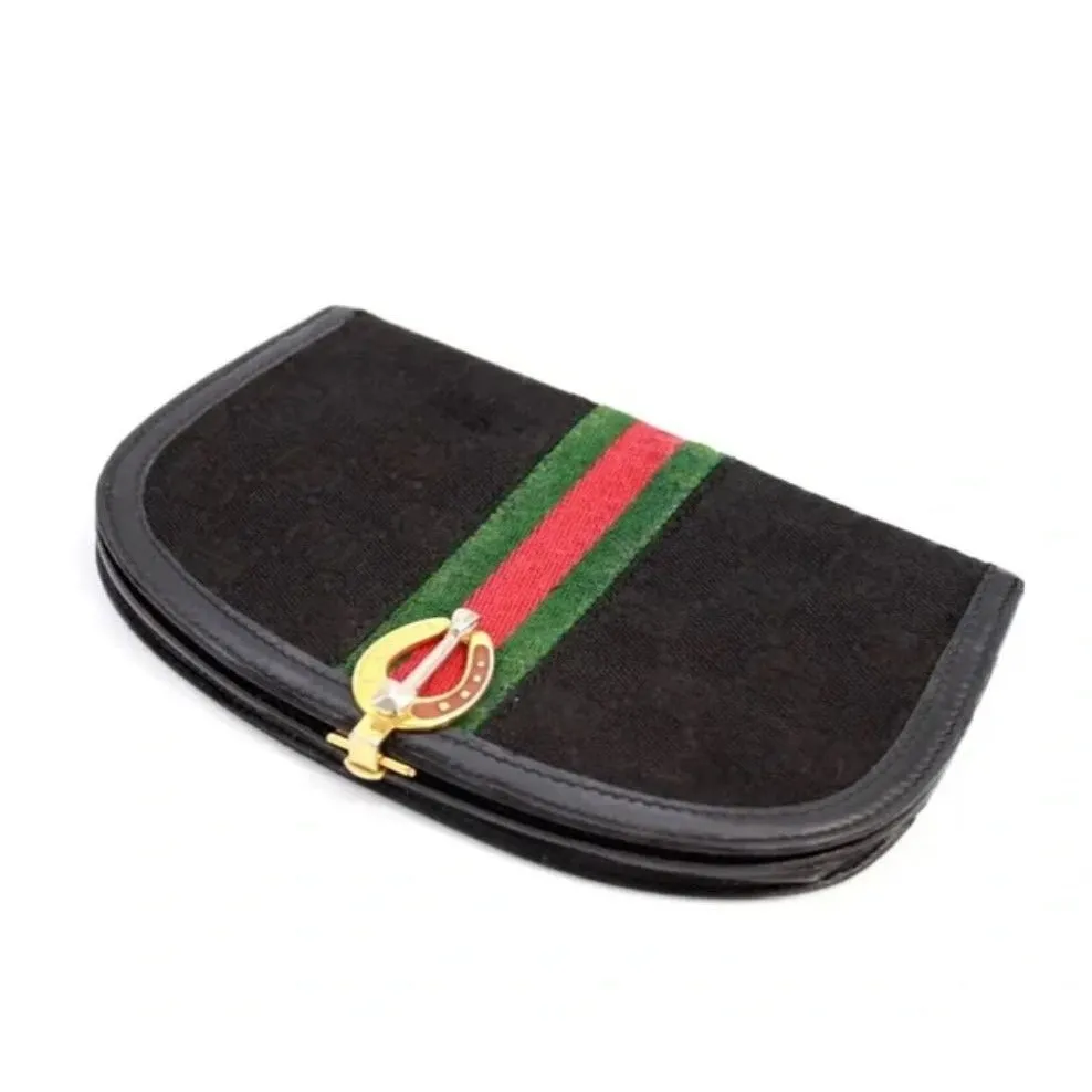 Rare, early Gucci, black Gucissima print canvas and black leather, semi-circular shape, wallet with an inlaid red and green Sherry stripe